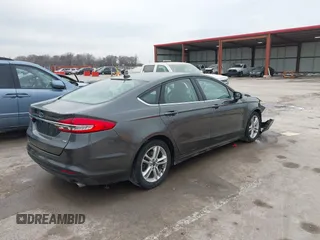 2018 Ford Fusion SE with VIN 3FA6P0H74JR125727, listed as a IAAI auction lot 41661939 with 100,446 mi miles. Bid and sale history available at carsss.com. Image 4.