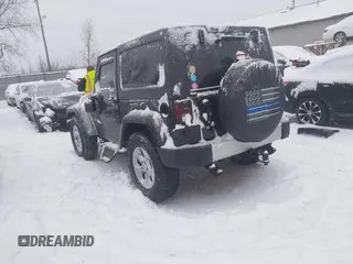 2014 Jeep Wrangler Sahara with VIN 1C4AJWBG3EL190302, listed as a IAAI auction lot 41299284 with 112,476 mi miles and . Bid and sale history available at DreamBid. Image 3.