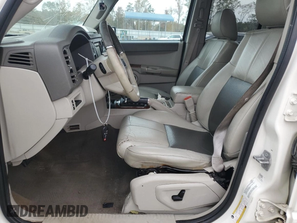 2010 Jeep Commander Limited z VIN 1J4RG5GT4AC153264, wystawiony jako Copart lot #77358474 z przebiegiem 170 634 mil mil oraz Szkoda całkowita • Salvage title. Historia ofert i sprzedaży dostępna na DreamBid. Obrazek 7.