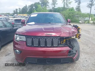 2021 Jeep Grand Cherokee Laredo X z VIN 1C4RJEAG0MC624737, wystawiony jako IAAI lot #42133614 z przebiegiem 61 970 mil mil oraz . Historia ofert i sprzedaży dostępna na DreamBid. Obrazek 12.