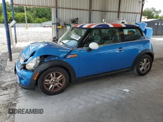 2011 MINI Hardtop with VIN WMWSU3C52BT252207, listed as a Copart auction lot 62735905 with 121,121 mi miles and Salvage title. Bid and sale history available at DreamBid. Image 1.
