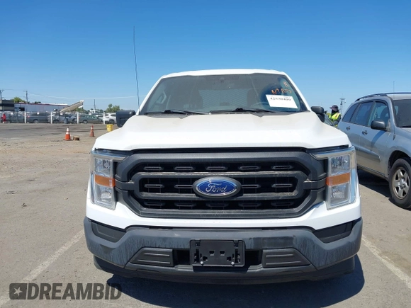 2021 Ford F-150 XL with VIN 1FTFW1CD1MFB31373, listed as a IAAI auction lot 42530409 with 119,956 mi miles and . Bid and sale history available at DreamBid. Image 12.