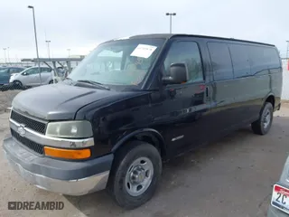 2004 Chevrolet Express Passenger with VIN 1GAHG39U641170703, listed as a IAAI auction lot 41745878 with 194,636 mi miles. Bid and sale history available at carsss.com. Image 2.
