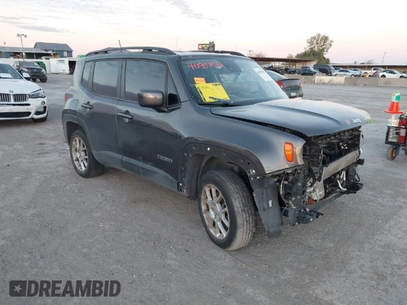 2021 Jeep Renegade Latitude with VIN ZACNJDBB0MPN13884, listed as a IAAI auction lot 40957052 with 52,023 mi miles. Bid and sale history available at carsss.com. Image 1.