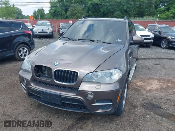 2012 BMW X5 35i with VIN 5UXZV4C59CL766849, listed as a IAAI auction lot 42749836 with 179,273 mi miles and . Bid and sale history available at DreamBid. Image 6.
