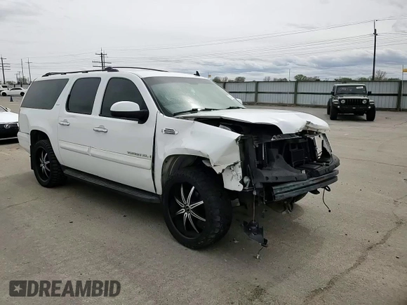 2007 GMC Yukon XL SLT z VIN 1GKFK16327J355384, wystawiony jako Copart lot #52161335 z przebiegiem 127 368 mil mil oraz Szkoda całkowita • Salvage title. Historia ofert i sprzedaży dostępna na DreamBid. Obrazek 11.