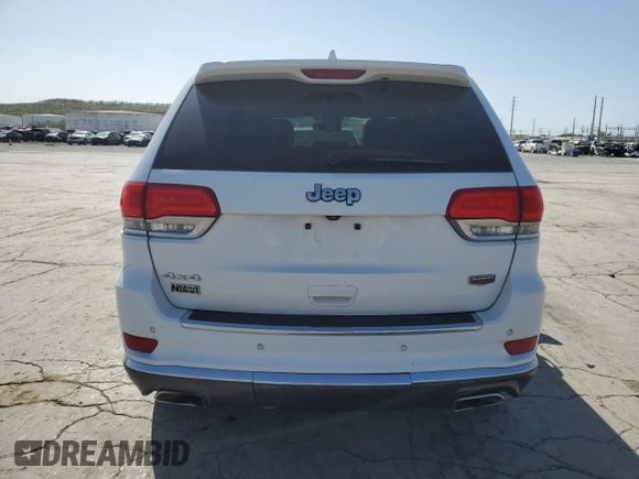 2015 Jeep Grand Cherokee Summit с VIN 1C4RJFJTXFC768298, выставлен на аукционе Copart как лот 52503035 с пробегом 170 364 миль миль и Списание • Salvage title. История ставок и продаж доступна на DreamBid. Изображение 6.