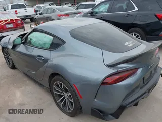 2021 Toyota Supra 2.0 with VIN WZ1DB2C0XMW038679, listed as a IAAI auction lot 42407988 with 76,316 mi miles and . Bid and sale history available at DreamBid. Image 3.