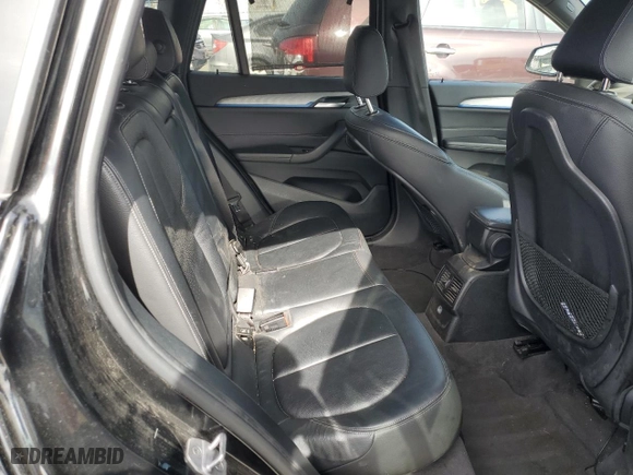 2018 BMW X1 sDrive28i with VIN WBXHU7C3XJ5L06006, listed as a Copart auction lot 47666595 with 56,142 mi miles and Salvage Title. Bid and sale history available at carsss.com. Image 11.