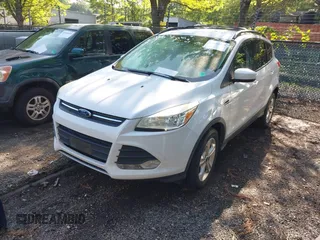 2013 Ford Escape SE with VIN 1FMCU0GX4DUC68046, listed as a IAAI auction lot 42839369 with 185,429 mi miles and . Bid and sale history available at DreamBid. Image 2.