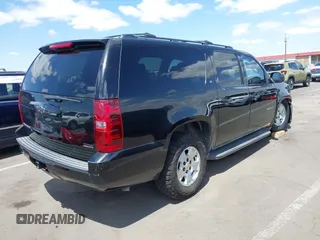 2012 Chevrolet Suburban LT with VIN 1GNSCJE00CR226285, listed as a IAAI auction lot 42059936 with 318,948 mi miles. Bid and sale history available at carsss.com. Image 4.