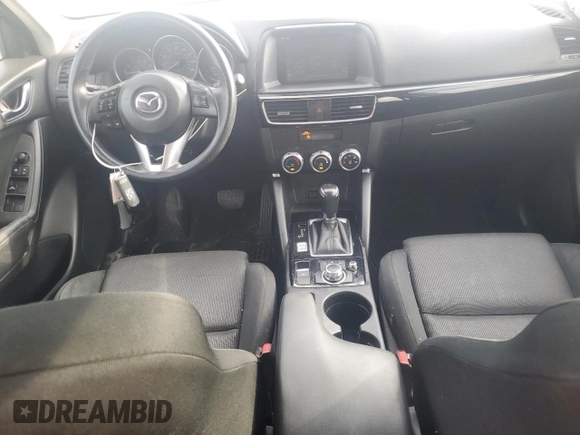 2016 Mazda CX-5 Sport with VIN JM3KE2BY0G0729349, listed as a Copart auction lot 62469735 with 88,247 mi miles and Salvage title. Bid and sale history available at DreamBid. Image 8.
