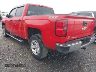 2014 Chevrolet Silverado 1500 LT with VIN 3GCUKREC9EG210621, listed as a IAAI auction lot 42011581 with Not Provided miles and . Bid and sale history available at DreamBid. Image 3.