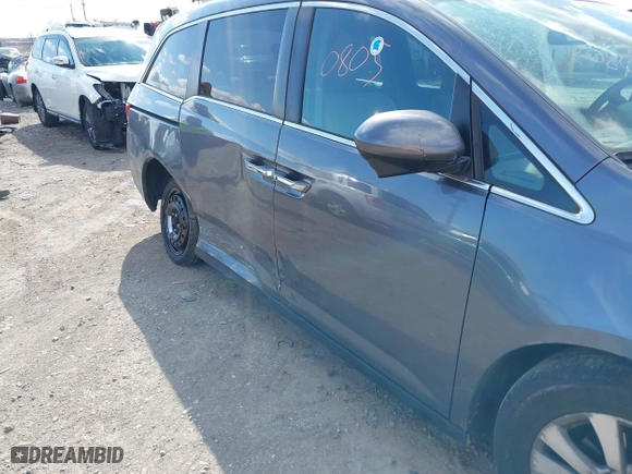 2016 Honda Odyssey SE with VIN 5FNRL5H3XGB043251, listed as a IAAI auction lot 42050805 with 156,537 mi miles. Bid and sale history available at carsss.com. Image 6.