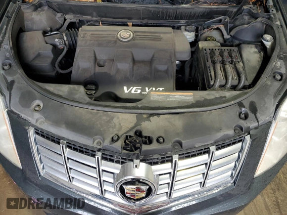 2015 Cadillac SRX z VIN 3GYFNAE34FS523702, wystawiony jako Copart lot #44706065 z przebiegiem 148 259 mil mil oraz Szkoda całkowita • Salvage title. Historia ofert i sprzedaży dostępna na DreamBid. Obrazek 12.