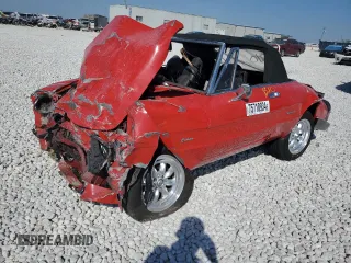 1986 Alfa Romeo Spider Veloce z VIN ZARBA5419G1043011, wystawiony jako Copart lot #75718934 z przebiegiem 59 364 mil mil oraz Szkody całkowita. Historia ofert i sprzedaży dostępna na DreamBid. Obrazek 1.