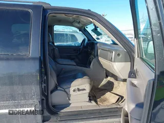 2004 Chevrolet Suburban LS with VIN 3GNEC16Z94G319009, listed as a IAAI auction lot 41531390 with 259,957 mi miles. Bid and sale history available at carsss.com. Image 5.