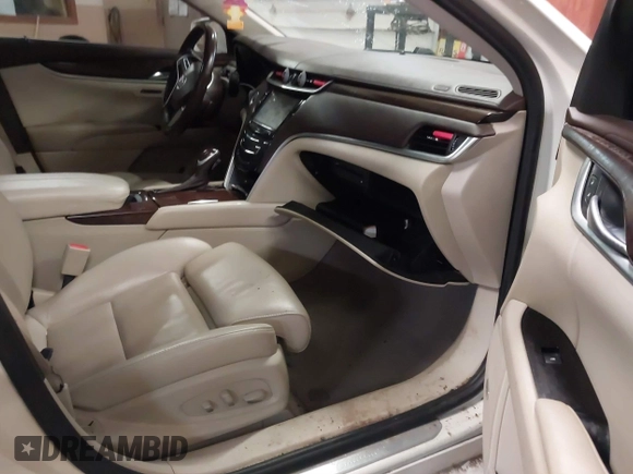 2013 Cadillac XTS Luxury with VIN 2G61R5S37D9152726, listed as a IAAI auction lot 41718331 with 88,189 mi miles and . Bid and sale history available at DreamBid. Image 5.