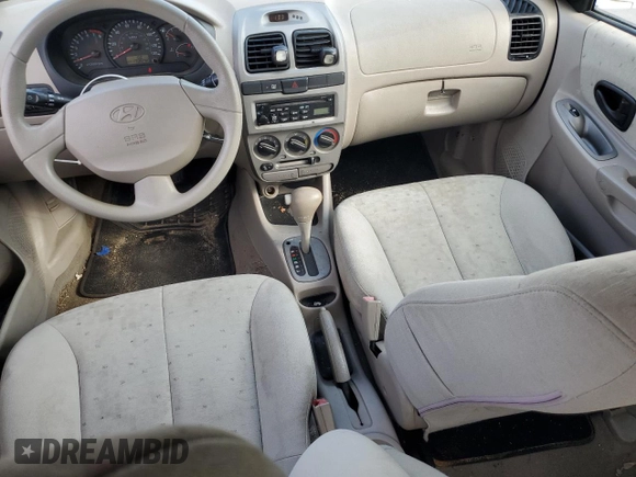 2005 Hyundai Accent GLS with VIN KMHCG45CX5U640554, listed as a Copart auction lot 77653664 with 179,642 mi miles and Clean Title. Bid and sale history available at carsss.com. Image 8.