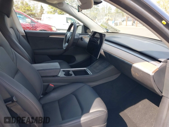 2023 Tesla Model Y Long Range with VIN 7SAYGDEE7PF856985, listed as a IAAI auction lot 42097675 with 13,112 mi miles and . Bid and sale history available at DreamBid. Image 5.