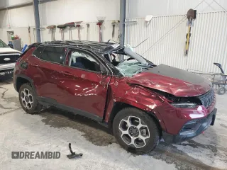 2022 Jeep Compass Trailhawk with VIN 3C4NJDDB7NT115064, listed as a Copart auction lot 58568375 with 13,267 mi miles and Salvage title. Bid and sale history available at DreamBid. Image 4.