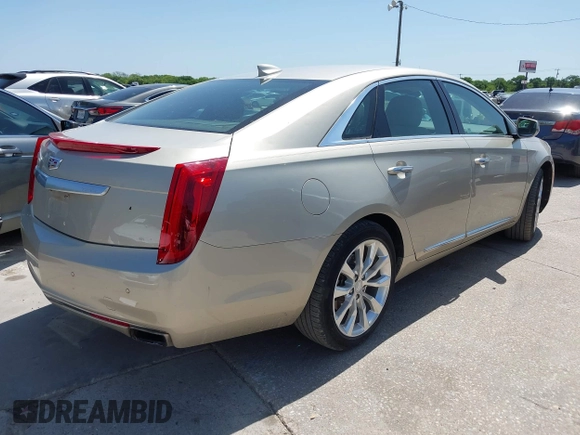 2016 Cadillac XTS Luxury Collection with VIN 2G61M5S31G9146455, listed as a IAAI auction lot 42019234 with 72,019 mi miles. Bid and sale history available at carsss.com. Image 4.