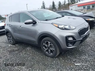 2020 Kia Sportage LX with VIN KNDPMCAC4L7802270, listed as a IAAI auction lot 41765002 with 64,185 mi miles. Bid and sale history available at carsss.com. Image 1.