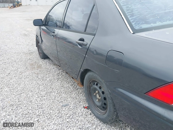 2003 Mitsubishi Lancer ES with VIN JA3AJ26E83U015342, listed as a IAAI auction lot 41819617 with 355,658 mi miles. Bid and sale history available at carsss.com. Image 13.
