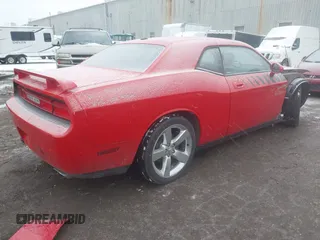 2010 Dodge Challenger R/T Classic z VIN 2B3CJ5DT7AH103121, wystawiony jako IAAI lot #41298456 z przebiegiem 147 685 mil mil oraz . Historia ofert i sprzedaży dostępna na DreamBid. Obrazek 4.