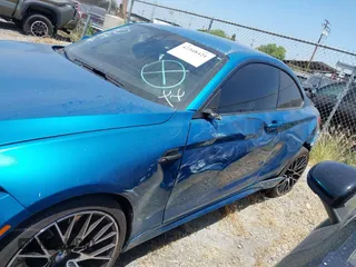 2018 BMW M2 z VIN WBS1J5C59JVE51997, wystawiony jako IAAI lot #42348421 z przebiegiem 51 376 mil mil oraz . Historia ofert i sprzedaży dostępna na DreamBid. Obrazek 14.