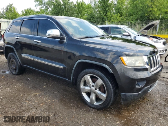 2011 Jeep Grand Cherokee Limited with VIN 1J4RR5GT4BC619724, listed as a Copart auction lot 63989905 with 212,198 mi miles and Clean title. Bid and sale history available at DreamBid. Image 4.