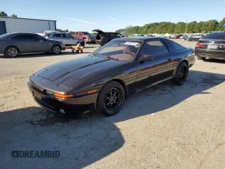 1989 Toyota Supra с VIN JT2MA70L3K0108058, выставлен на аукционе Copart как лот 58058225 с пробегом 71 164 миль миль и Чистый • Clean title. История ставок и продаж доступна на DreamBid. Изображение 1.