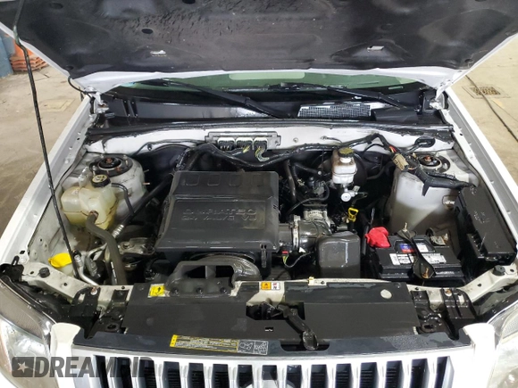 2010 Mercury Mariner с VIN 4M2CN8BG7AKJ16805, выставлен на аукционе Copart как лот 53829505 с пробегом 120 540 миль миль и Чистый • Clean title. История ставок и продаж доступна на DreamBid. Изображение 12.
