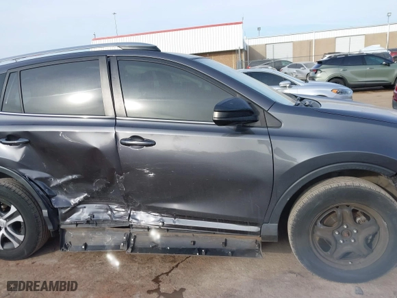 2018 Toyota RAV4 LE with VIN JTMZFREV4JJ183106, listed as a IAAI auction lot 41449468 with 114,719 mi miles. Bid and sale history available at carsss.com. Image 13.