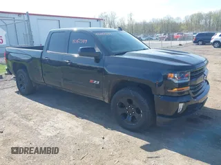 2017 Chevrolet Silverado 1500 LT with VIN 1GCVKREC6HZ271160, listed as a IAAI auction lot 42162389 with 103,992 mi miles and . Bid and sale history available at DreamBid. Image 1.