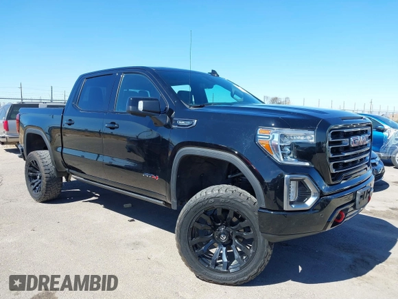 2021 GMC Sierra 1500 AT4 with VIN 3GTP9EED5MG206008, listed as a IAAI auction lot 41665423 with 61,685 mi miles. Bid and sale history available at carsss.com. Image 1.