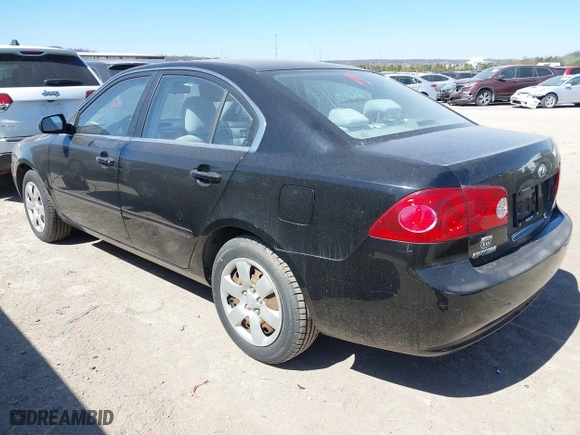 2008 Kia Optima LX with VIN KNAGE123985242231, listed as a IAAI auction lot 41838786 with 217,754 mi miles. Bid and sale history available at carsss.com. Image 3.