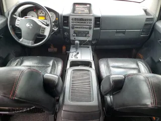 2008 Nissan Titan XE z VIN 1N6AA07F18N341057, wystawiony jako Copart lot #53976465 z przebiegiem 206 495 mil mil oraz Czysty tytuł • Clean title. Historia ofert i sprzedaży dostępna na DreamBid. Obrazek 8.