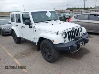 2016 Jeep Wrangler Unlimited Sahara z VIN 1C4BJWEG8GL164359, wystawiony jako IAAI lot #42194622 z przebiegiem 96 211 mil mil oraz . Historia ofert i sprzedaży dostępna na DreamBid. Obrazek 1.