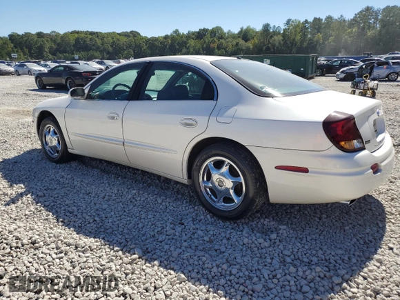 2003 Oldsmobile Aurora z VIN 1G3GS64CX34163493, wystawiony jako Copart lot #75863314 z przebiegiem 211 607 mil mil oraz Szkody całkowita. Historia ofert i sprzedaży dostępna na DreamBid. Obrazek 2.