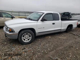2001 Dodge Dakota Sport with VIN 1B7GL22N01S284441, listed as a Copart auction lot 83486504 with 114,613 mi miles and Salvage Title. Bid and sale history available at carsss.com. Image 1.