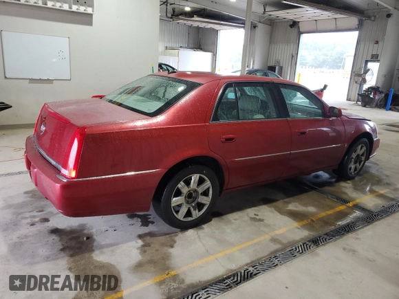 2007 Cadillac DTS Luxury I z VIN 1G6KD57Y97U160132, wystawiony jako Copart lot #60872185 z przebiegiem 135 440 mil mil oraz Szkoda całkowita • Salvage title. Historia ofert i sprzedaży dostępna na DreamBid. Obrazek 3.