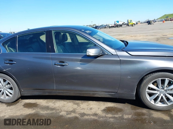 2014 Infiniti Q50 with VIN JN1BV7AP0EM682444, listed as a IAAI auction lot 41857312 with 140,765 mi miles. Bid and sale history available at carsss.com. Image 13.