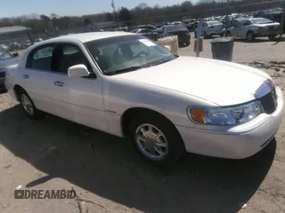 1998 Lincoln Town Car Signature with VIN 1LNFM82W7WY681858, listed as a IAAI auction lot 41846483 with 195,968 mi miles and . Bid and sale history available at DreamBid. Image 1.