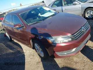 2014 Volkswagen Passat S w/Nav with VIN 1VWAP7A30EC009933, listed as a IAAI auction lot 41690840 with 202,200 mi miles. Bid and sale history available at carsss.com. Image 1.
