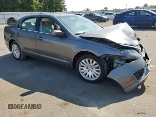 2010 Ford Fusion Hybrid z VIN 3FADP0L33AR267806, wystawiony jako Copart lot #55952815 z przebiegiem 146 912 mil mil oraz Szkoda całkowita • Salvage title. Historia ofert i sprzedaży dostępna na DreamBid. Obrazek 4.