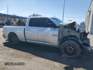2015 Ram 1500 Lone Star with VIN 1C6RR6GT4FS512252, listed as a Copart auction lot 49677395 with 124,847 mi miles and Salvage Title. Bid and sale history available at carsss.com. Image 4.