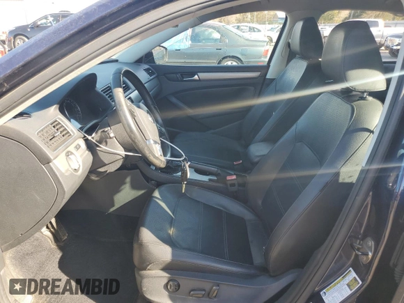 2014 Volkswagen Passat SE z VIN 1VWBN7A36EC053431, wystawiony jako Copart lot #49343735 z przebiegiem 102 845 mil mil oraz Szkoda całkowita • Salvage title. Historia ofert i sprzedaży dostępna na DreamBid. Obrazek 7.