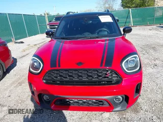 2023 MINI Countryman Cooper S z VIN WMZ83BR03P3R02336, wystawiony jako IAAI lot #41943111 z przebiegiem 22 784 mil mil oraz . Historia ofert i sprzedaży dostępna na DreamBid. Obrazek 12.