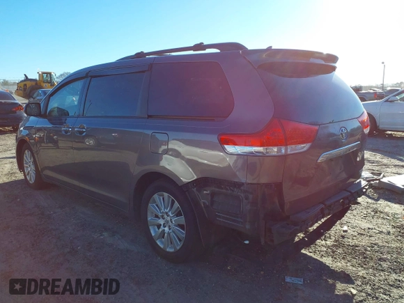 2011 Toyota Sienna XLE with VIN 5TDDK3DC8BS009739, listed as a IAAI auction lot 41638710 with 235,396 mi miles. Bid and sale history available at carsss.com. Image 3.